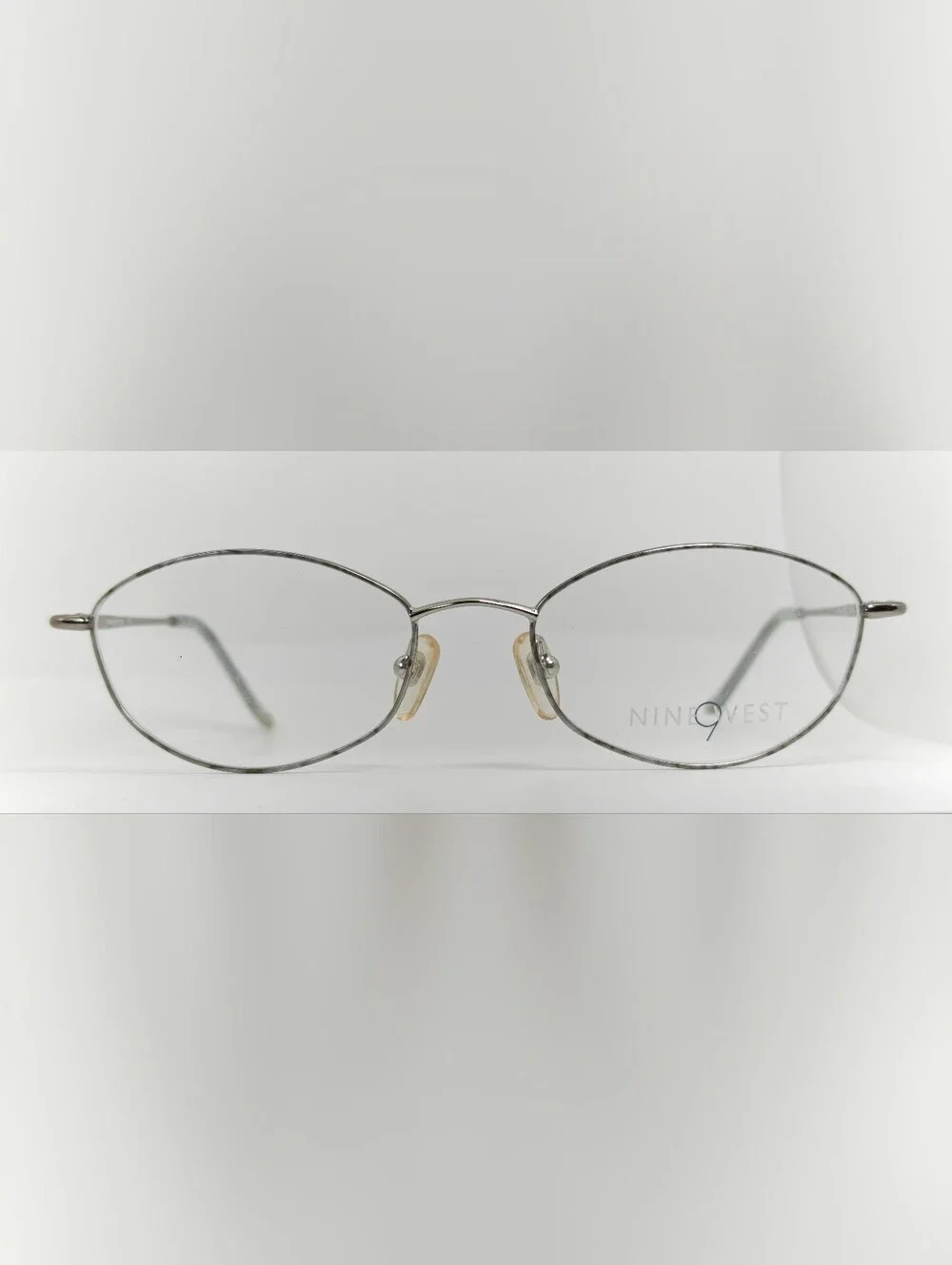 Nine West. 308. Silver Oval Wireframe. Ivory Grey Tortoise Front.